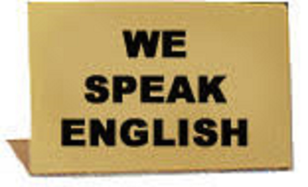 SHOWCASE SIGN \"WE SPEAK ENGLISH\"